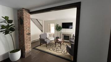 Smart TV, fireplace, books