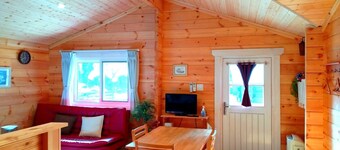 Chartered log house / Aso Kumamoto