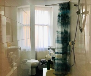 Apartment | Bathroom | Combined shower/tub, deep soaking tub, hair dryer, towels