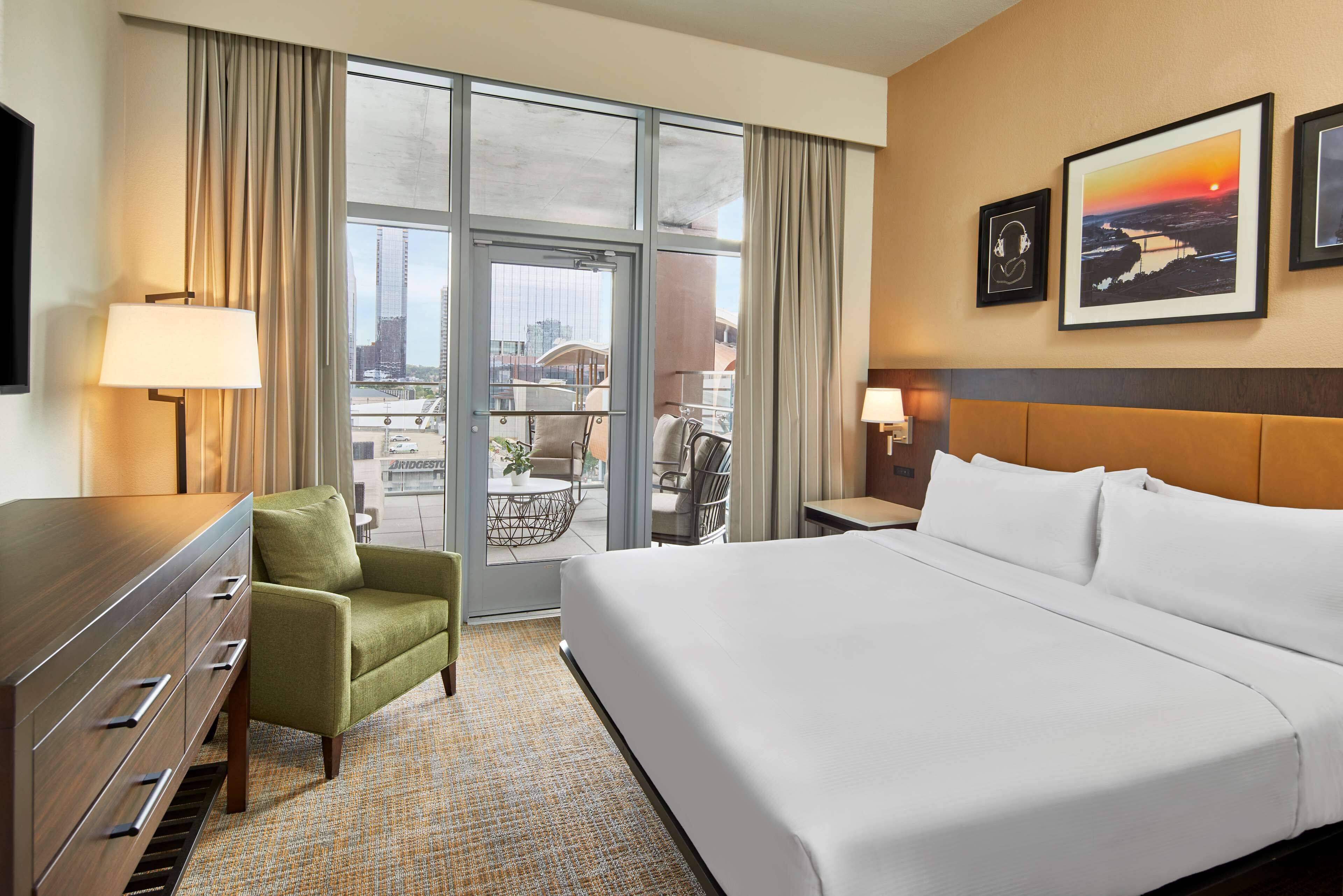 Suite, 1 King Bed, Balcony | In-room safe, desk, laptop workspace, blackout drapes
