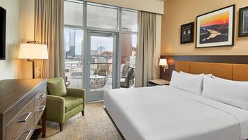 Suite, 1 King Bed, Balcony | In-room safe, desk, laptop workspace, blackout drapes