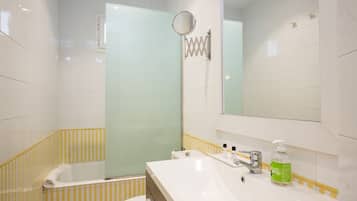 Hair dryer, towels, soap, shampoo