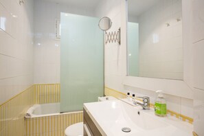Hair dryer, towels, soap, shampoo