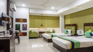 Deluxe Room | In-room safe, desk, iron/ironing board, bed sheets