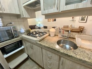 Private kitchen - ⭐️⭐️⭐️⭐️⭐️ Flat Village Maresias - 100 meters from the beach (maresias)