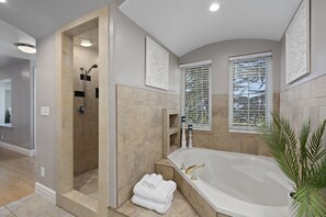 Combined shower/bathtub, hair dryer, towels, soap