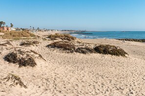 On the beach, sun-loungers, beach towels