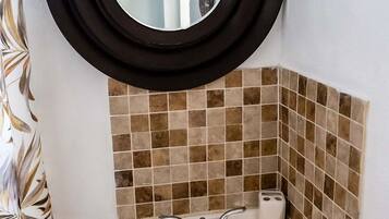 Combined shower/tub, hair dryer, towels, soap