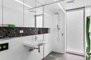 Bathtub, hair dryer, towels - Architect Designed Coastal Retreat with Views. (Blackmans Bay)