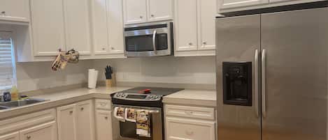 Microwave, dishwasher, cookware/dishes/utensils