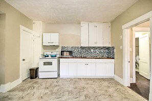 Fridge, microwave, stovetop, cookware/dishes/utensils