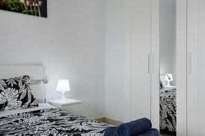 2 dormitorios, tabla de planchar con plancha, wifi gratis y ropa de cama