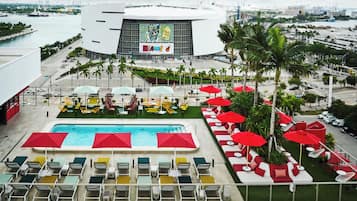 Outdoor pool, open 7:00 AM to 9:00 PM, pool umbrellas, sun loungers