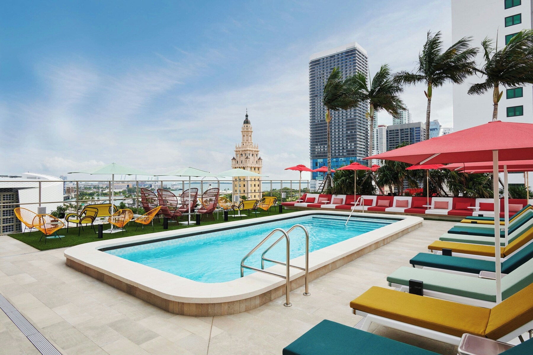 Outdoor pool, open 7:00 AM to 9:00 PM, pool umbrellas, sun loungers