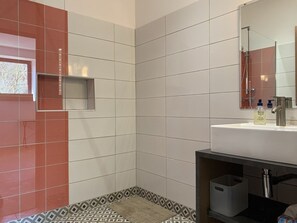 Combined shower/tub, hair dryer, towels, toilet paper