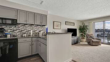 Fridge, microwave, stovetop, coffee/tea maker