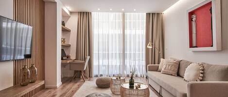 Luxury Apartment | Living area | 55-inch Smart TV with digital channels, TV, computer monitors