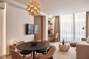 Luxury Apartment | Living area | 55-inch Smart TV with digital channels, TV, computer monitors - Charitos Boutique Apartment Kolonaki (Athens)