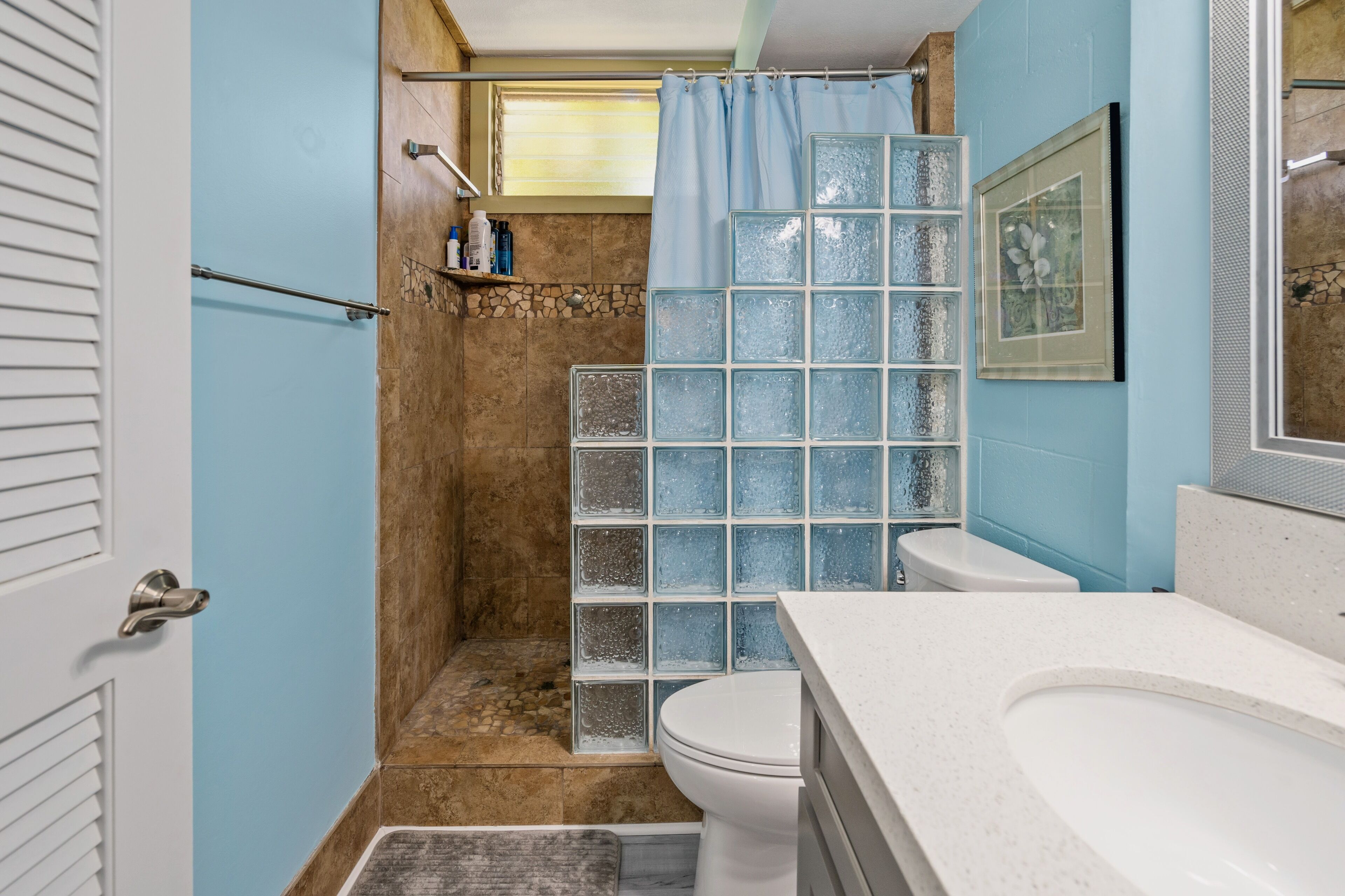 Shower, hair dryer, towels, soap