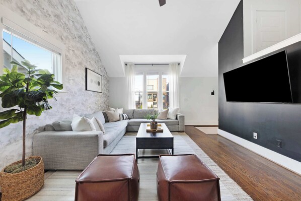 Smart TV, fireplace, foosball, books