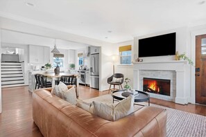 Smart TV, fireplace, foosball, books