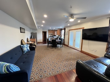Large/Open Living area, 65" smart TV, direct access to 2nd floor balcony