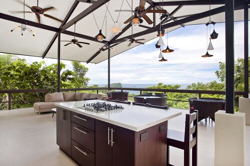 Large Ocean Views with Outdoor Living/Kitchen area, Huge pool w/Slide