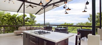 Large Ocean Views with Outdoor Living/Kitchen area, Huge pool w/Slide