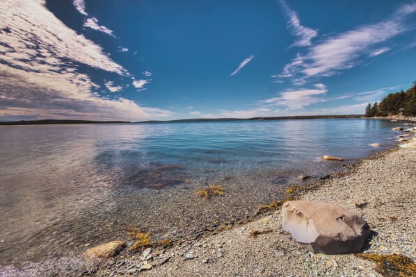 Enjoy serene lakeside views from the comfort of this peaceful retreat.