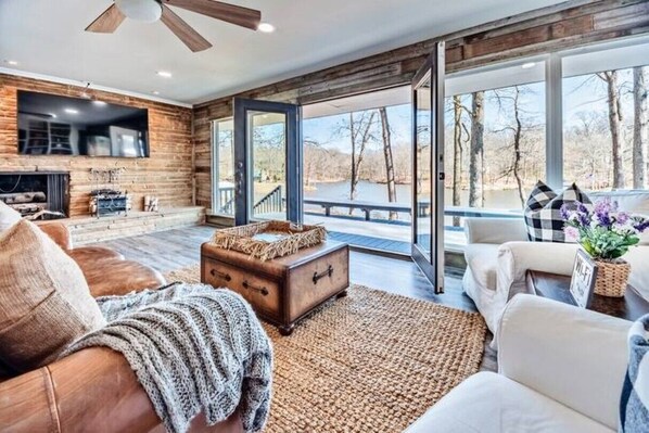 Smart TV, fireplace, table football, books