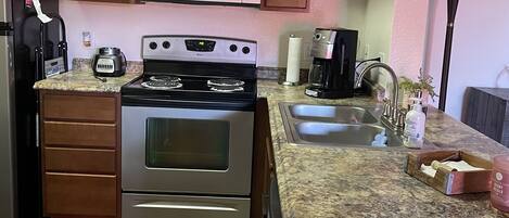 Microwave, stovetop, dishwasher, coffee/tea maker