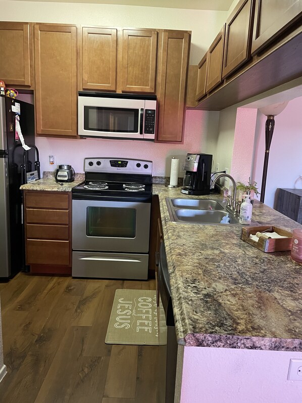 Microwave, stovetop, dishwasher, coffee/tea maker