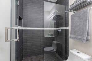Shower, hair dryer, towels, soap