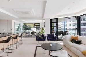 TV, offices - Spectacular Sunrises & Sea Views - Pool, Spa, Gym (Mount Maunganui)