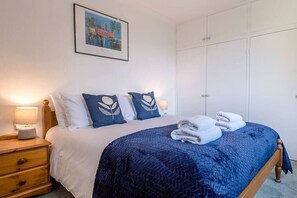 4 bedrooms, iron/ironing board, travel cot, WiFi