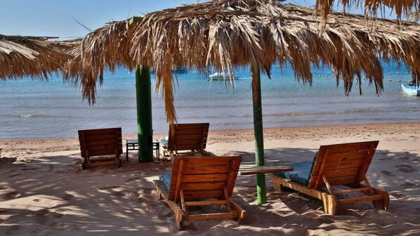 Private beach, sun loungers, beach umbrellas, beach towels