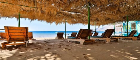 Private beach, sun loungers, beach umbrellas, beach towels