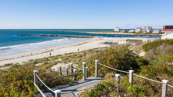 Na praia, toalhas de praia