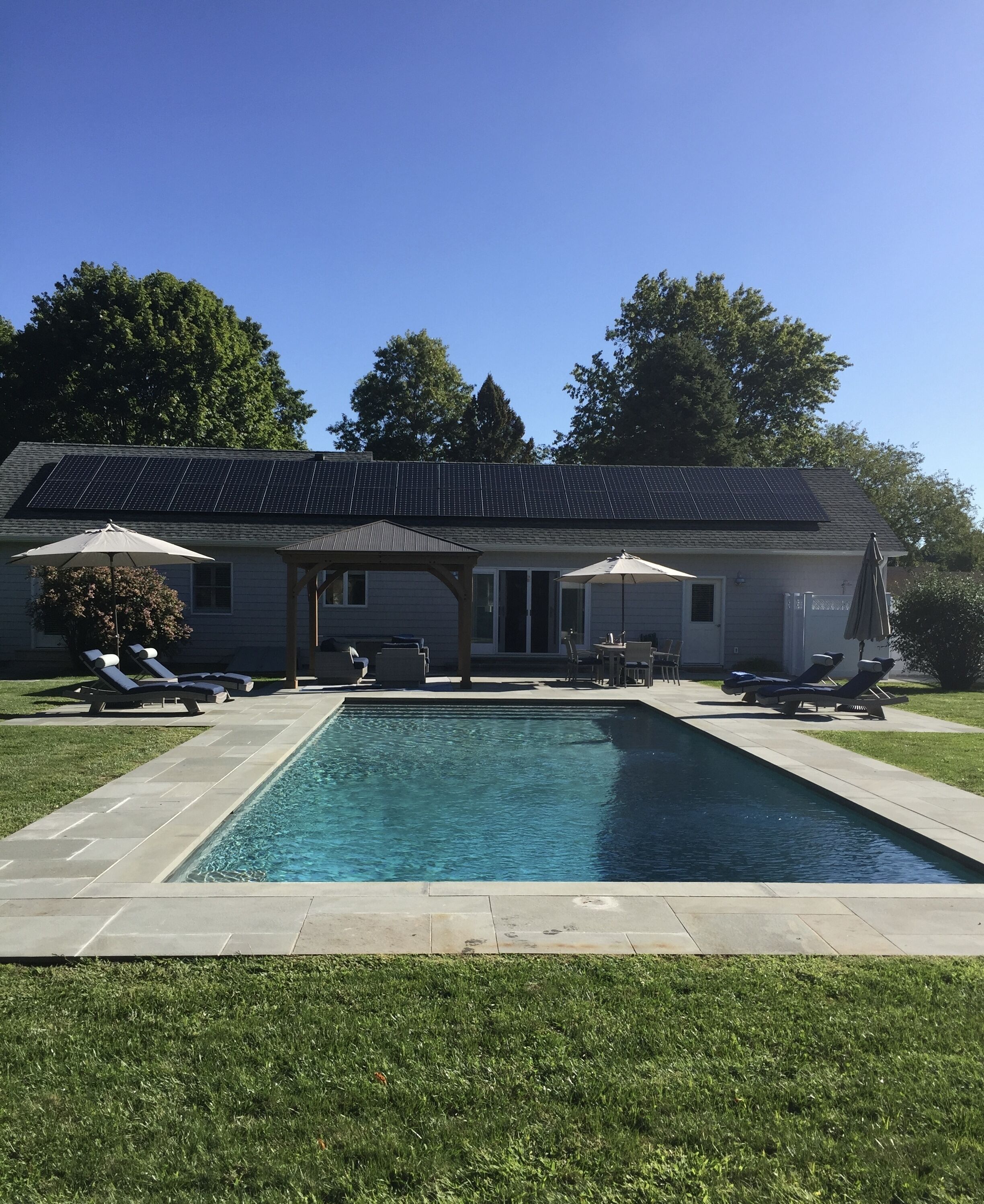 Private heated pool and spacious yard. 5 minute walk to the beach.