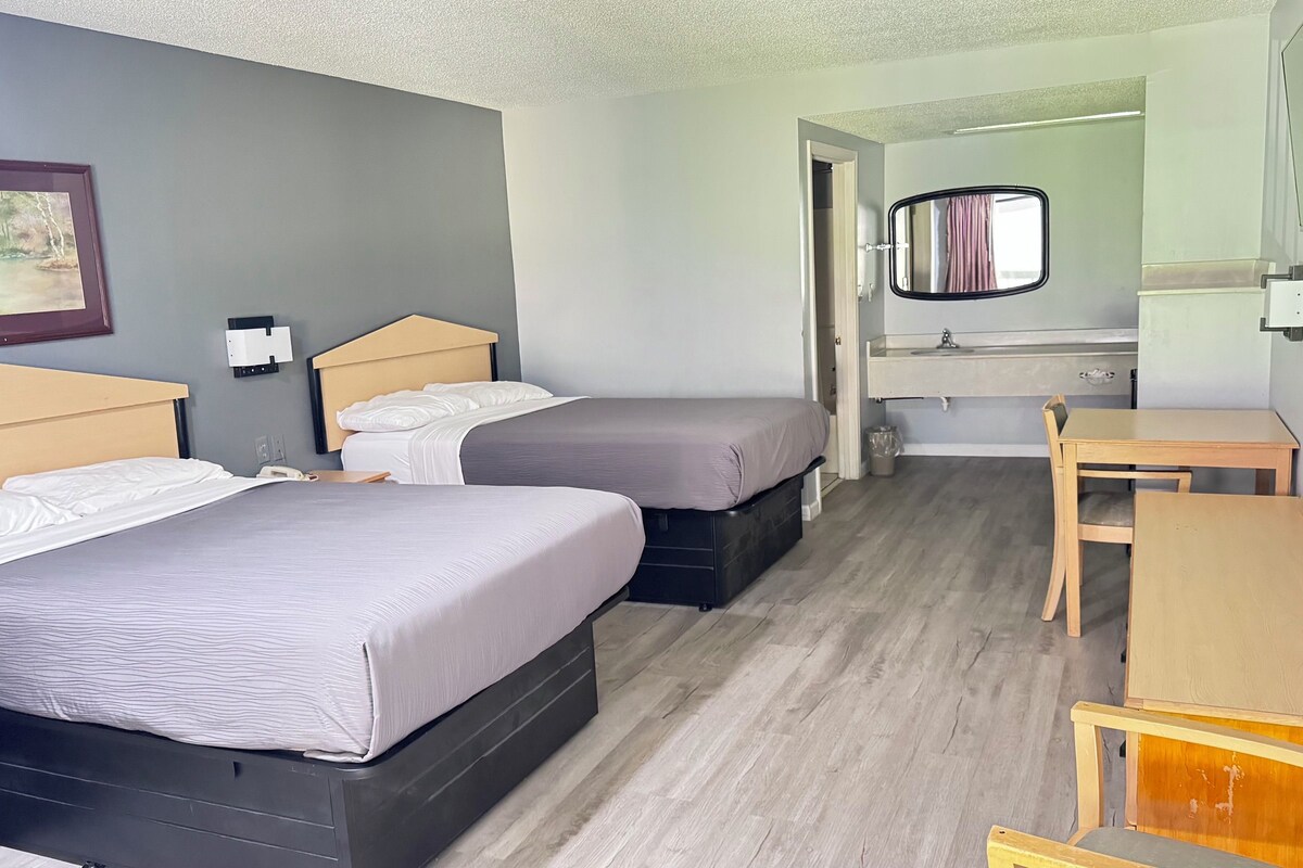 Standard Room, 2 Double Beds, Smoking | WiFi (free), bed sheets