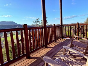 Terrace/patio - VIEWS! Stunning 4BR Cabin w/GameRoom & Pool Access! Located 7 Mins from PF Pkwy! (Pigeon Forge)