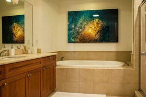 Bathtub, hair dryer, towels, soap