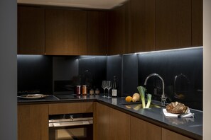 One Bedroom Apartment with Internal Balcony | Private kitchen | Fridge, microwave, oven, dishwasher