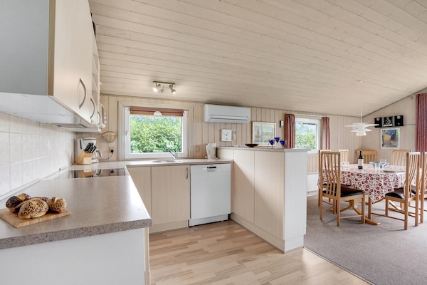 Fridge, stovetop, dishwasher, coffee/tea maker