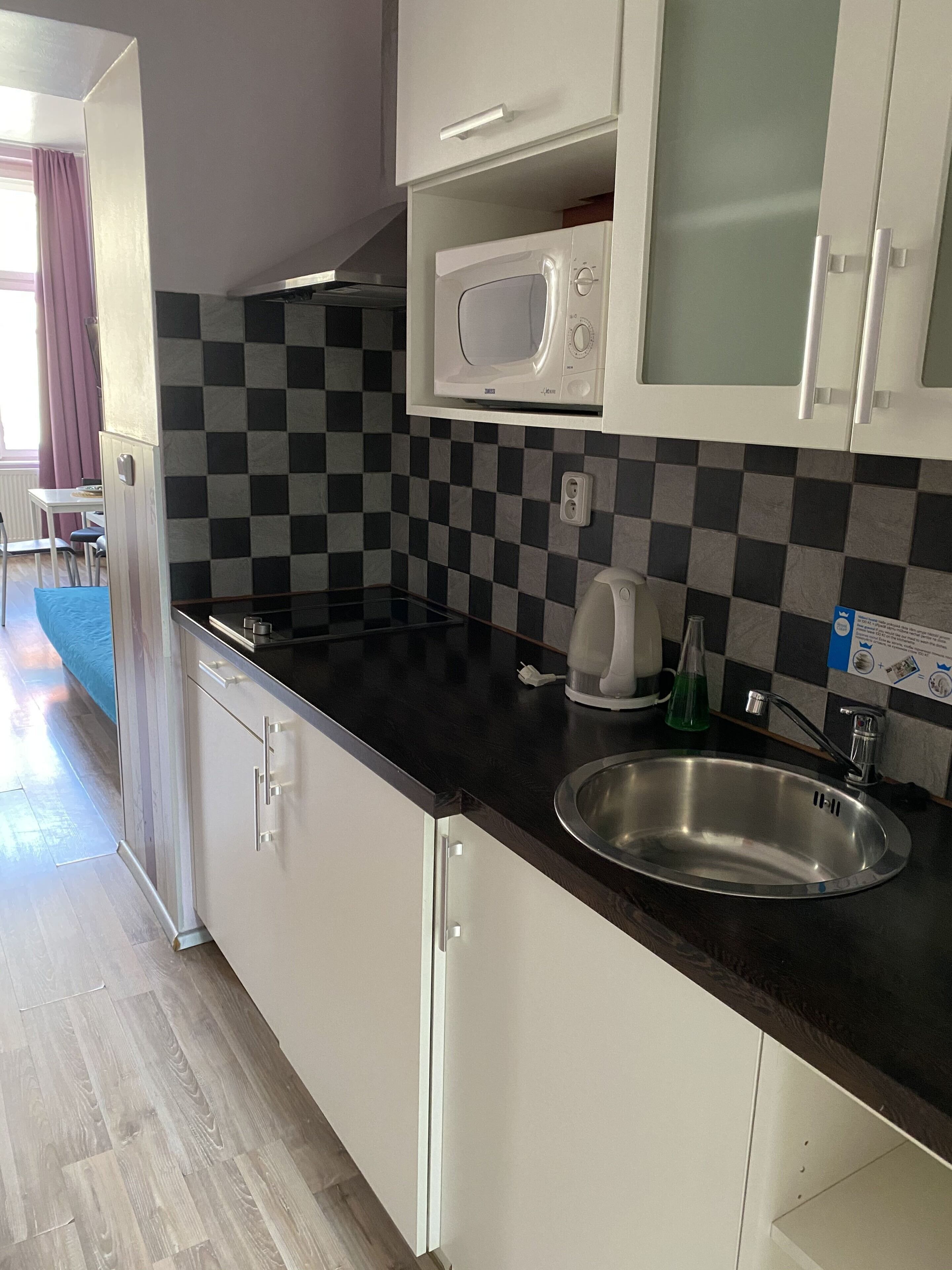 Fridge, microwave, electric kettle, cookware/dishes/utensils