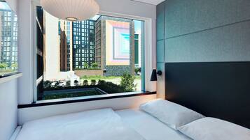 Ropa de cama de alta calidad, colchones con pillow-top y escritorio