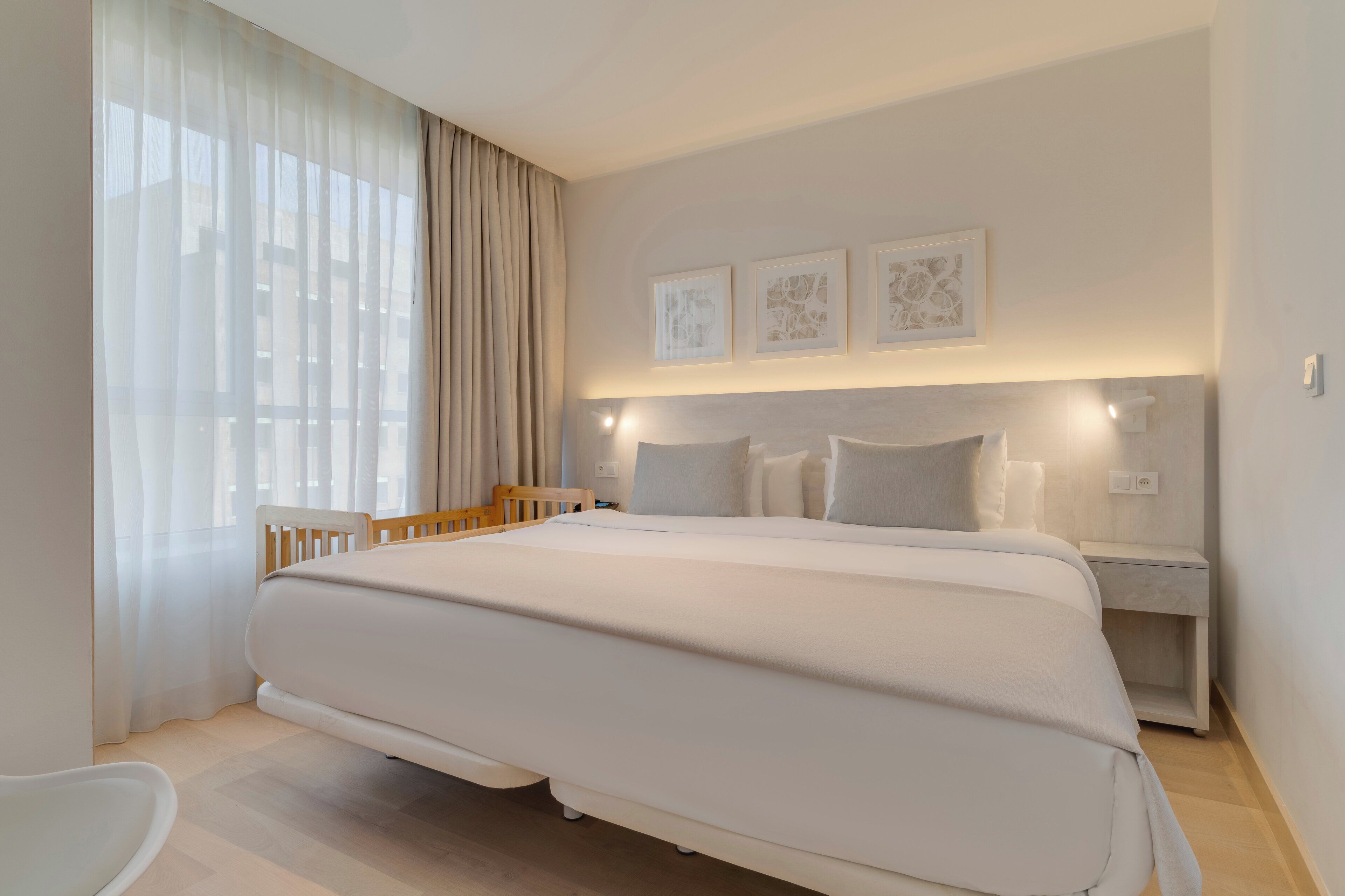Minibar, laptop workspace, bed sheets
