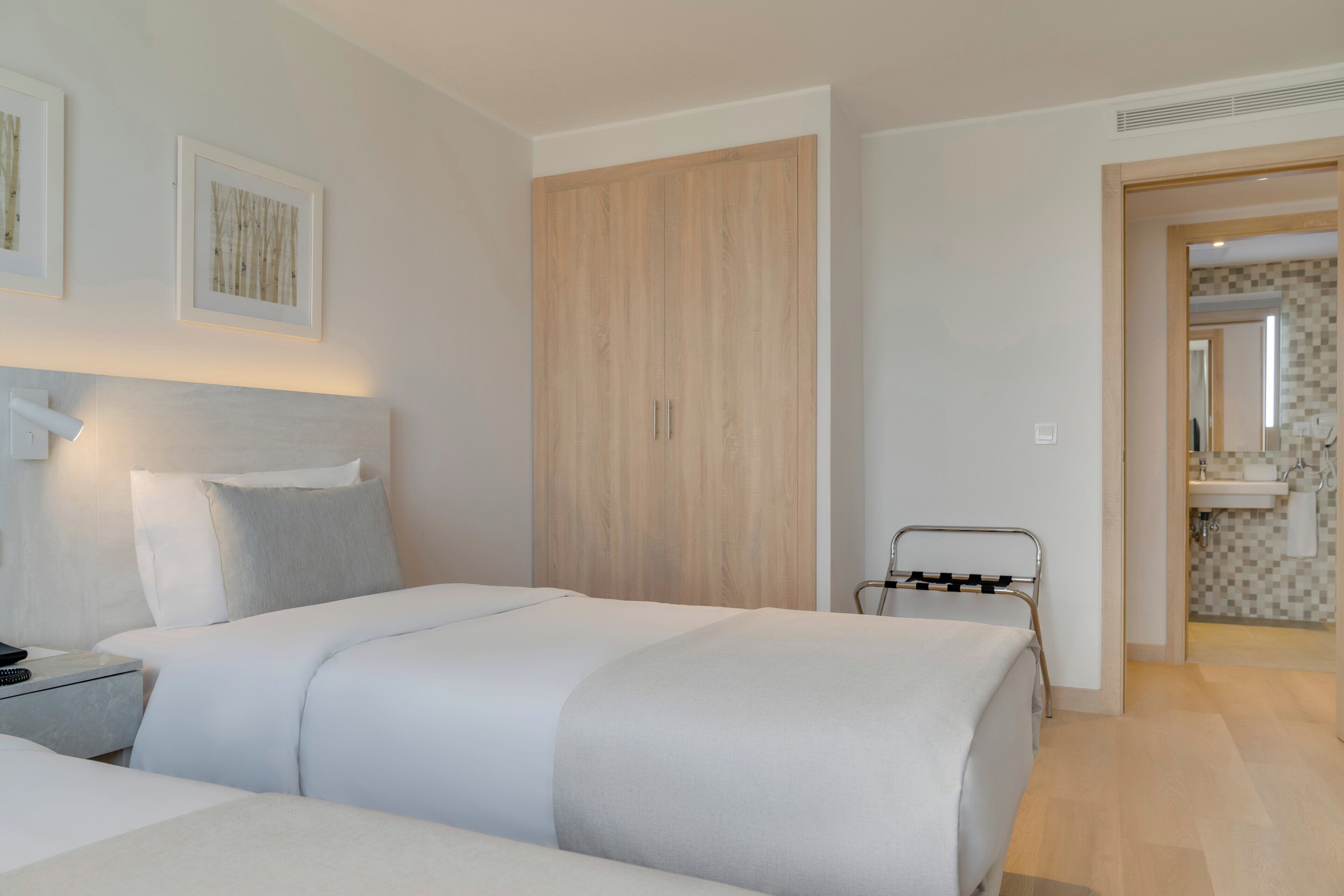 Minibar, laptop workspace, bed sheets