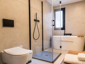 Bathtub, hair dryer, towels