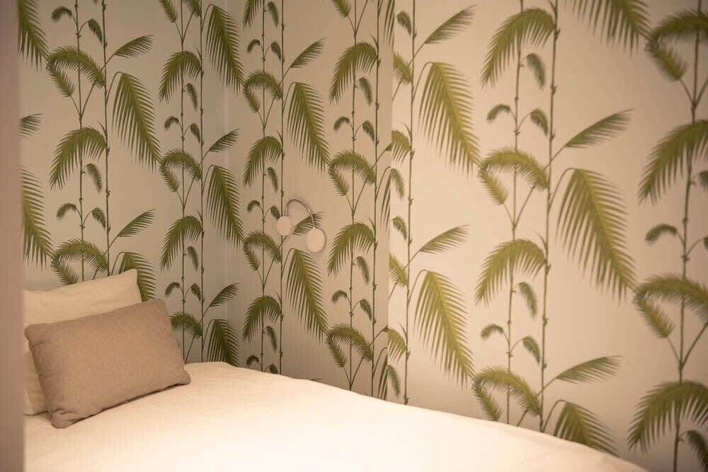 2 dormitorios, tabla de planchar con plancha, cuna de viaje y wifi